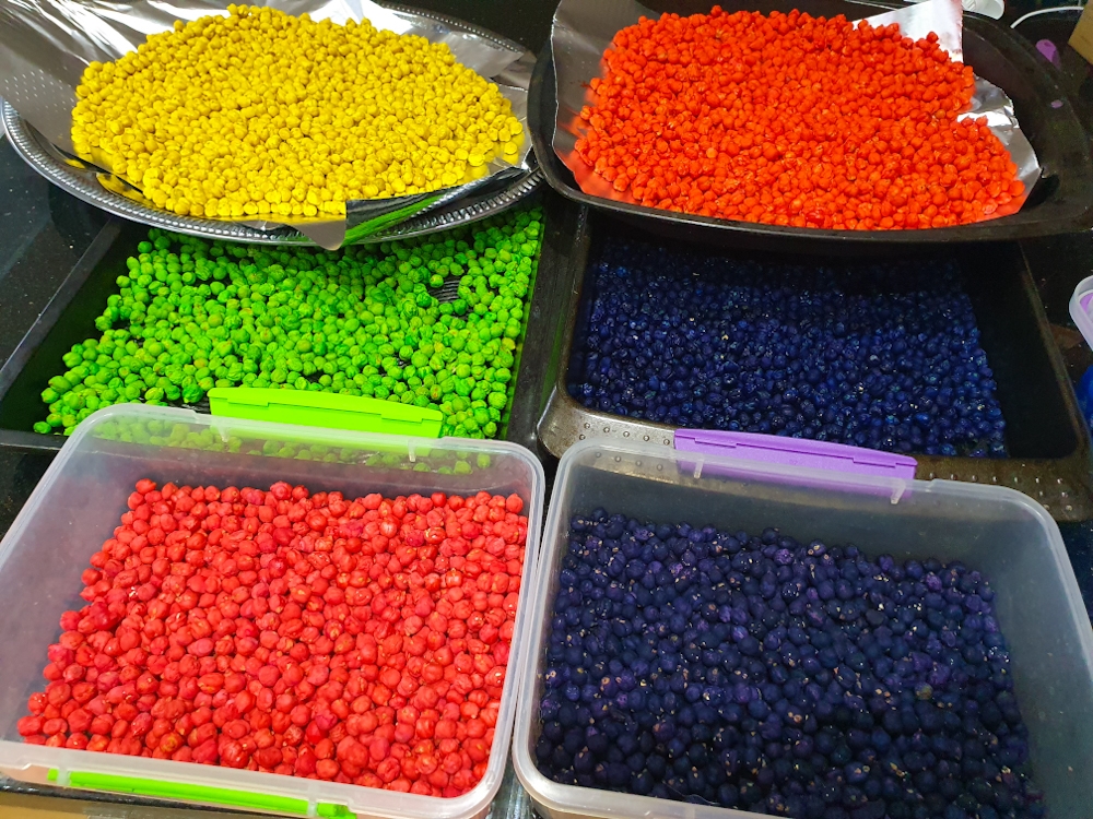 Dyed chickpeas drying